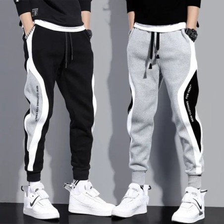 Pantalones anchos informales y sueltos para hombre, pantalones deportivos de retales de nueve puntos, cuerda elástica, transpira