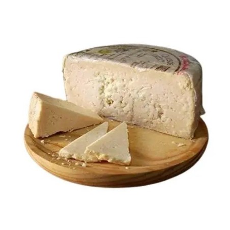 QUESO ROMERO OCAÑA para paladares exquisitos, graso, mantecoso, con pique, granuloso y quebradizo, color ocre, debido a su larg